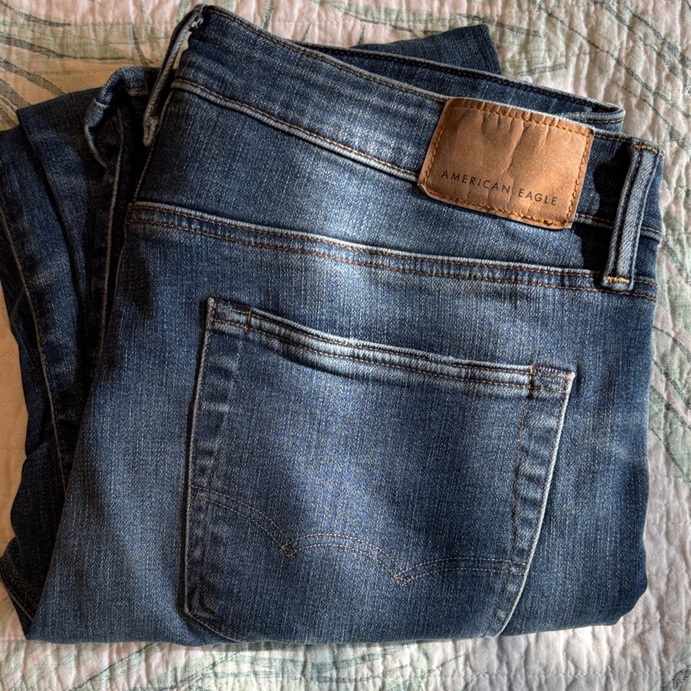 American Eagle Men's Dark Blue Airflex Original Bootcut jeans. Size 34/32